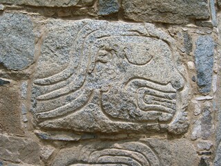 Relief representing severed head blooding at archaeological complex Sechin near Casma (central coast of Peru)