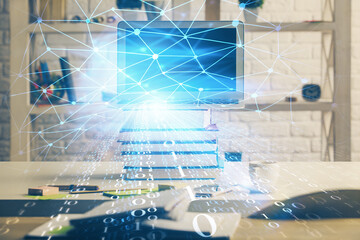 Multi exposure of desktop computer and technology theme hologram. Concept of software development.