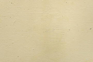 Yellow old concrete wall texture background.