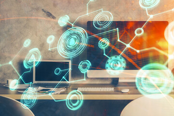 Computer on desktop with social network theme icon. Multi exposure. Concept of international connections.