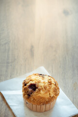 Muffin cake on wooden table use for background sweet food desserts on breakfast