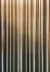 Background of wooden trim painted with gold paint