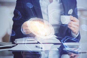 Man's hands working with notes background. Cryptocurrency and finance concept.