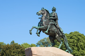 Sculpture of Peter the Great (The Bronze Horseman) close-up on a sunny June day. Saint-Petersburg, Russia