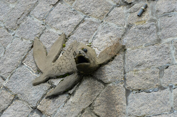 Matsu, Taiwan - JUN 27, 2019: Fish statue on stone wall.