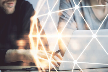 Media network theme hologram with man working on computer on background. Concept of internet...