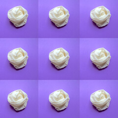 White latex medical glove folded in the form of a rose seamless pattern background