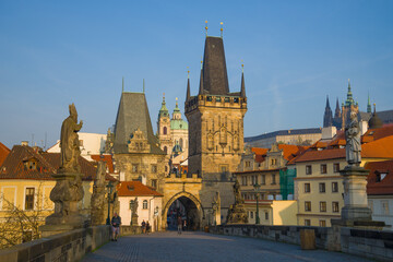 Fototapeta na wymiar West bridge towers of Charles Bridge on April morning. Prague, Czech Republic