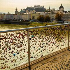 Locks on a bridge, with Salzburg Castle in the background, Salzburg, Austria