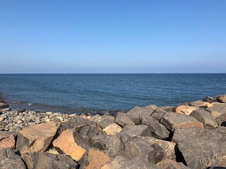 Fototapeta na wymiar Rocks in the seashore of the Ennore beach, Tamil nadu
