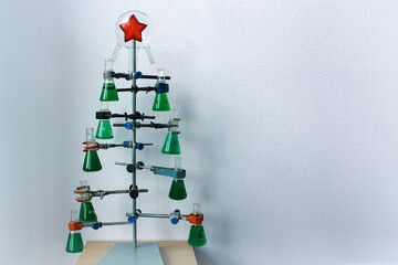 homemade Christmas tree from flasks with green liquids.