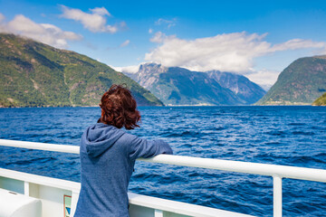 Tourist woman on ferryboat, Norway
