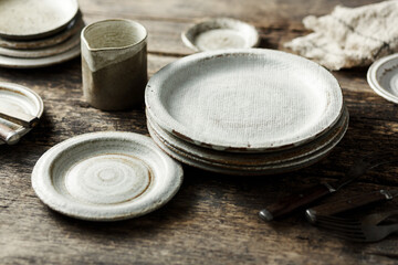 Set of modern ceramic tableware, handmade. Selective focus.