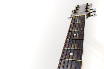 Guitar neck and free space on a white background