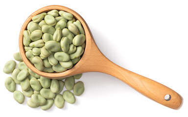 dried green broad beans in the wooden spoon, isolated on white background, top view