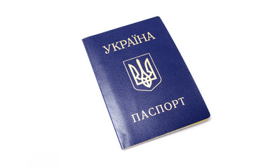 Ukrainian passport on a white background. The passport of the citizen of Ukraine in the macro. Passport General plan and close-up