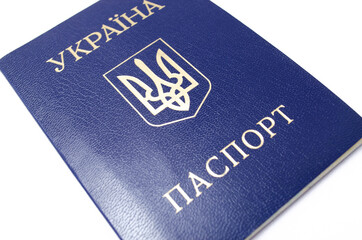 Ukrainian passport on a white background. The passport of the citizen of Ukraine in the macro. Passport General plan and close-up