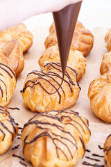 Cooking profiteroles on the table