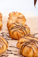 Cooking profiteroles on the table