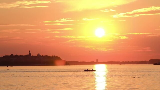 Beautiful sunset over Danube river in Belgrade capital of Serbia with Zemun municipality in the background