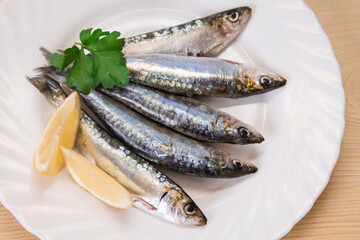 fish, fresh sardines on the plate