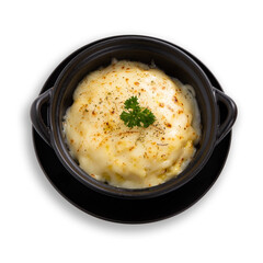 Baked potato with cheese on black plate on white background.