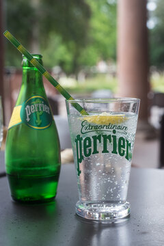 Mulhouse - France - 26 June 2020 - Closeup of Perrier glass of carbonated mineral water on terrace restaurant