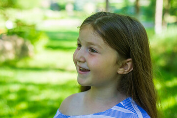 pretty girl in the park, portrait of a little girl