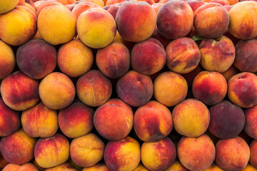 Fresh organic peach on market.
