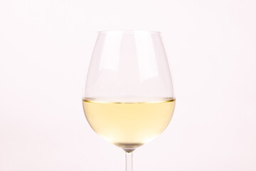 Close-up a glass of white wine on white background isolated