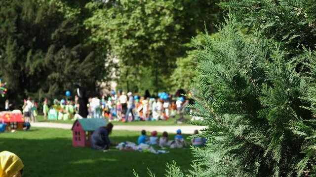 Someone is watching children from the bushes