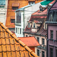 Traditional architecture of Old town of Riga, Latvia. Close-up of red tile roof. Modern exterior.