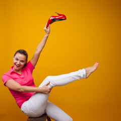 Young woman took off her stiletto shoes and happy freedom foot