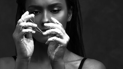 Obraz premium Glued hands, weakness and confusion in problems, concept. Beautiful young woman