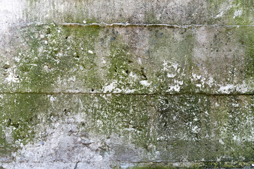 Close-up - gray stone wall in the old facade of the house