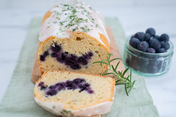 home made sweet blueberry sponge cake with rosemary