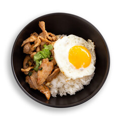 Stir fried pork garlic and pepper topped with rice with fried egg on white background.