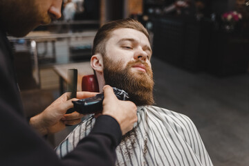 Barber cuts beard to a brutal guy