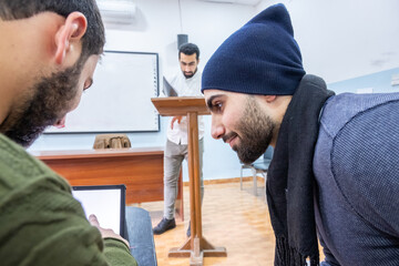 Arabic students discussing things in class