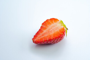 Ripe strawberries on a white background