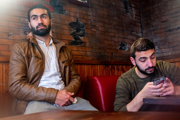 Friends at restaurant waiting for food