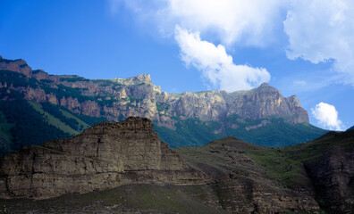 Fototapeta premium Mountains against the sky and clouds