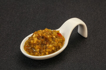 Green spicy sauce in the bowl