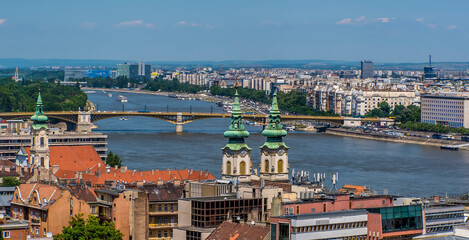 Fototapeta na wymiar The view from the Fisherman's Bastion towards Margaret Island in Budapest in the summertime