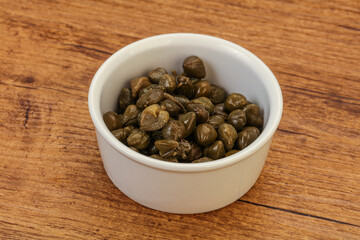 Tasty capers in the bowl