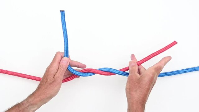 Demonstration of tying a Reef or Square knot to join two pieces of rope