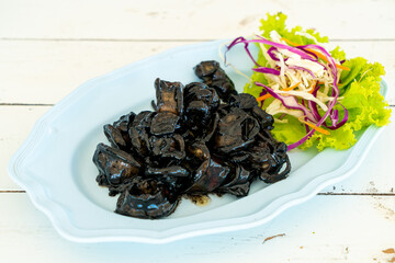 fried squid with squid ink sauce
