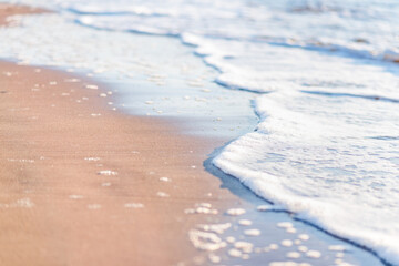 on a sandy beach beautiful gentle turquoise tide of waves