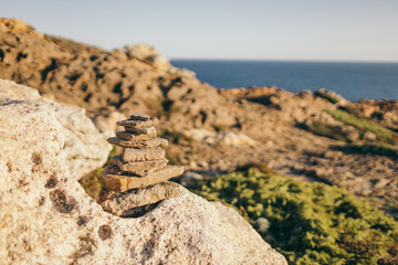 A close up of a rock near the ocean