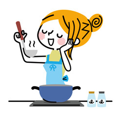 料理をする主婦　味見